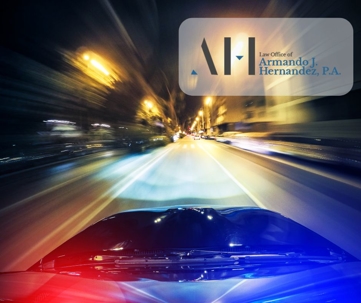 police car driving fast